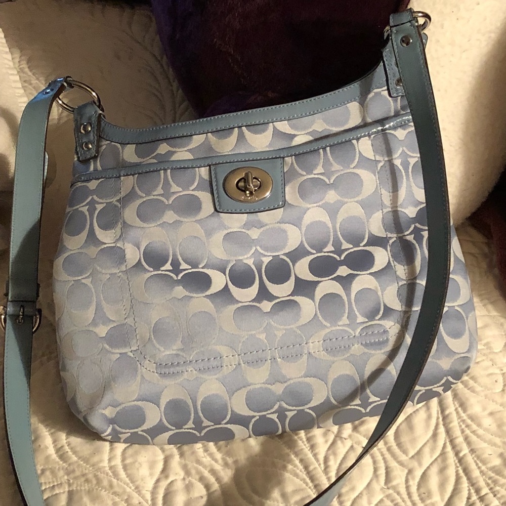 Light blue crossbody Coach purse